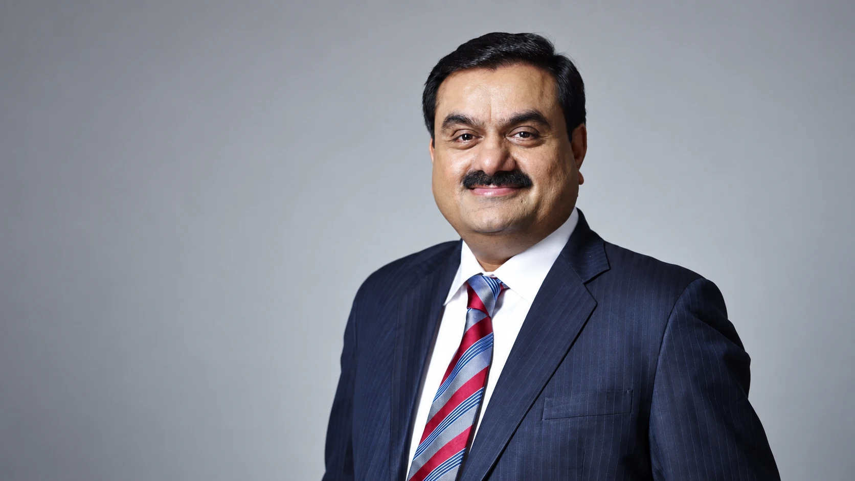 Who is Gautam Adani? - dave calhoun and gautam adani